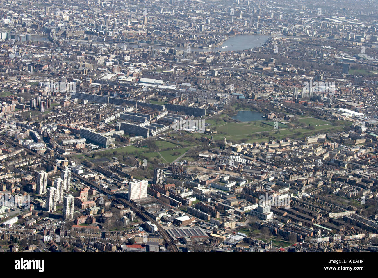 Aerial view north east of Burgess Park suburban houses and tower blocks Walworth Bermondsey amd Rotherhithe London SE1 SE5 SE15 Stock Photo