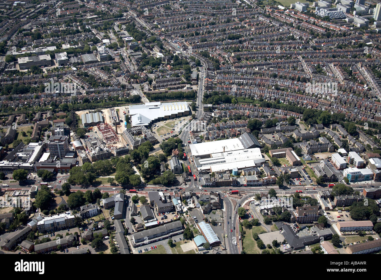 Aerial view west of Tottenham Town Hall Baths Library Leisure Centre and suburban housing Haringey London N15 UK High level obl Stock Photo