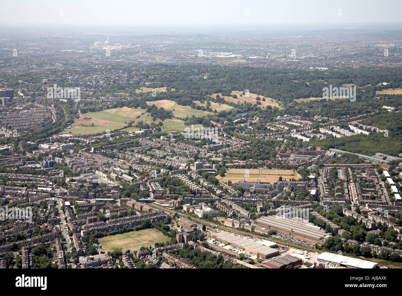 Aerial view north west of Hampstead Heath and Haringey suburban housing London N6 NW5 England UK High level oblique Stock Photo