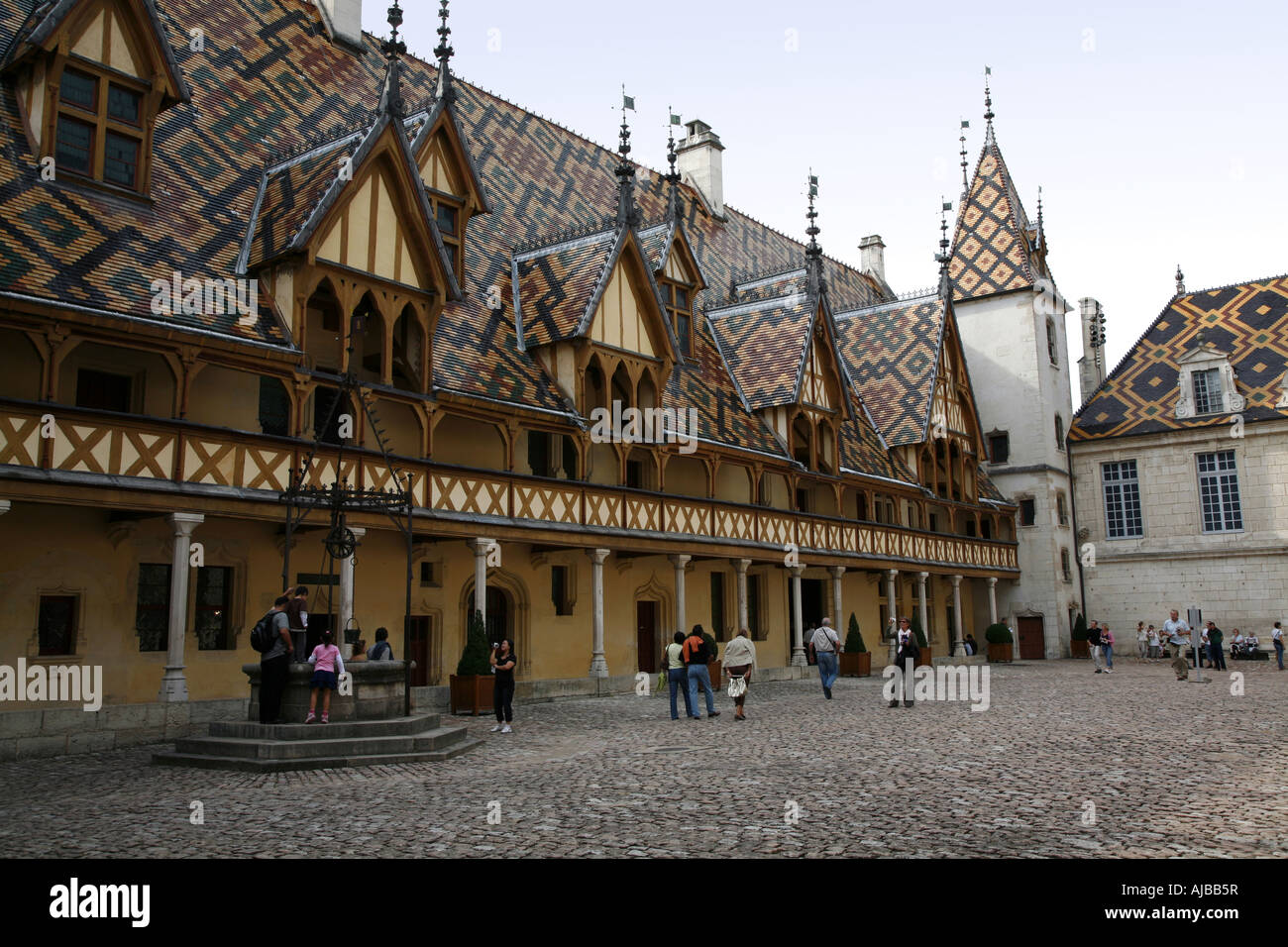The coloured roof tiles of the Hospices de Beaune the Hotel Dieu in the centre of the city Stock Photo