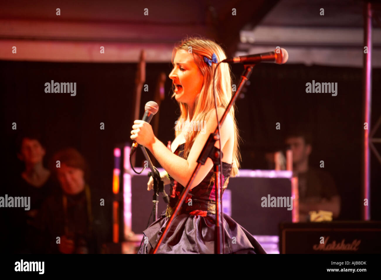 Woman singer on main amphitheatre stage at Woodford Folk Festival Queensland Australia Stock Photo