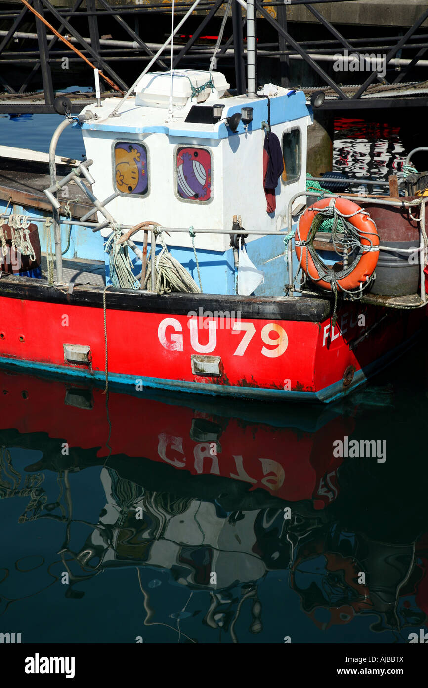 Guernsey St Peter Port, Fishing boat reflections at Fish Quay Stock