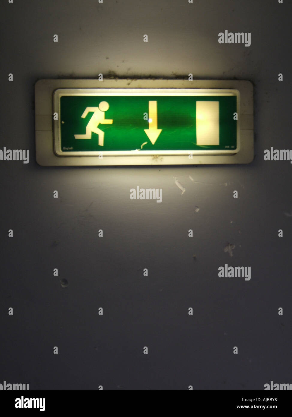 Exit Sign For Rooom emergency exit sign in dark room Stock Photo - Alamy
