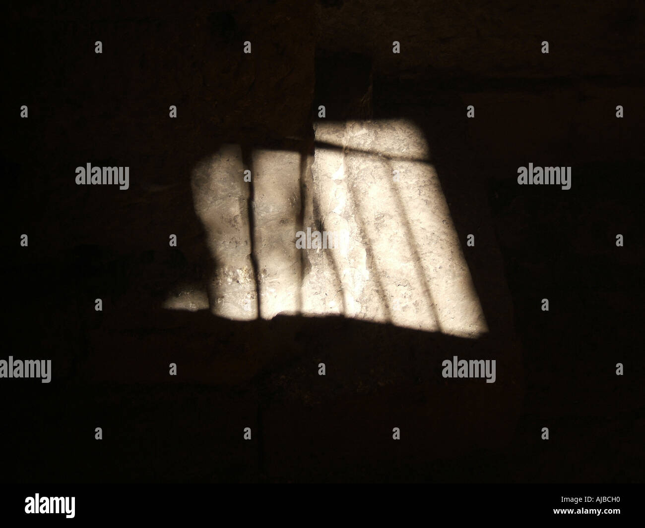 shadow of window with bars Stock Photo Alamy