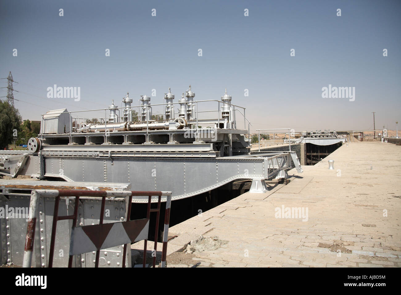 Flow adjustment equipment on old British Dam River Nile above Aswan Upper southern Egypt Africa Stock Photo