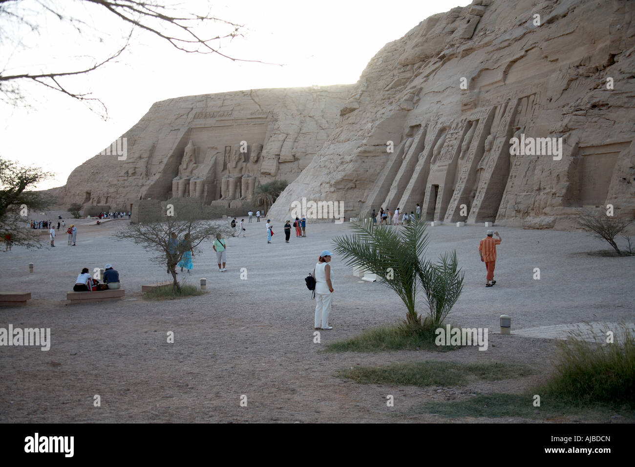 Exterior of tow temples at Abu Simbel with visitors Upper Egypt Africa Stock Photo