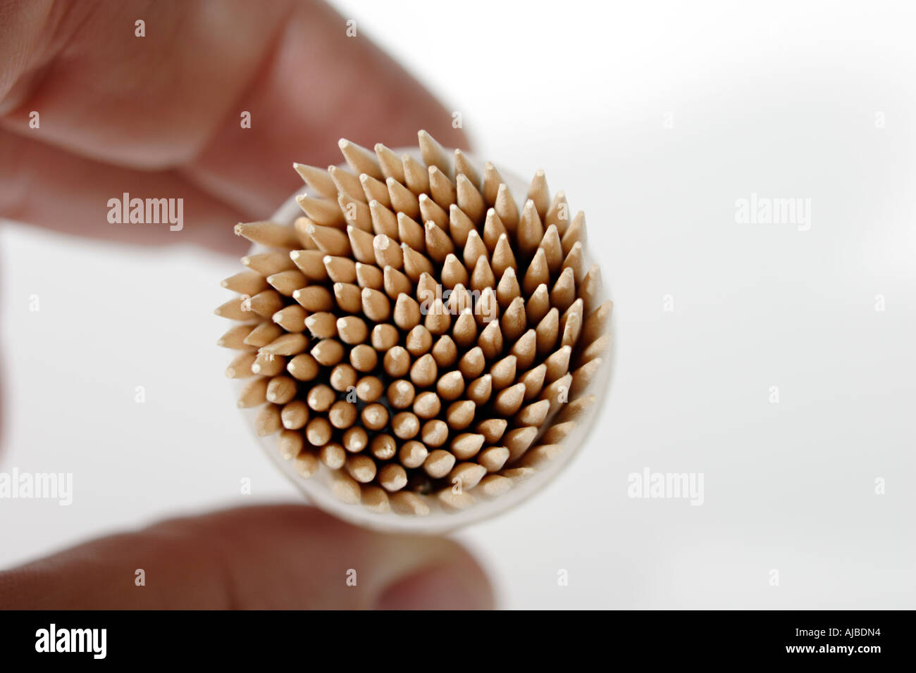 Hand holding box with toothpicks Stock Photo Alamy