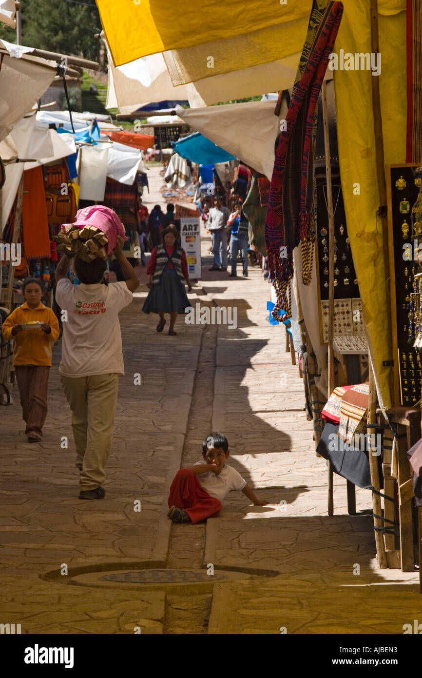 Alleyway of stalls in Pisac Market Peru Stock Photo