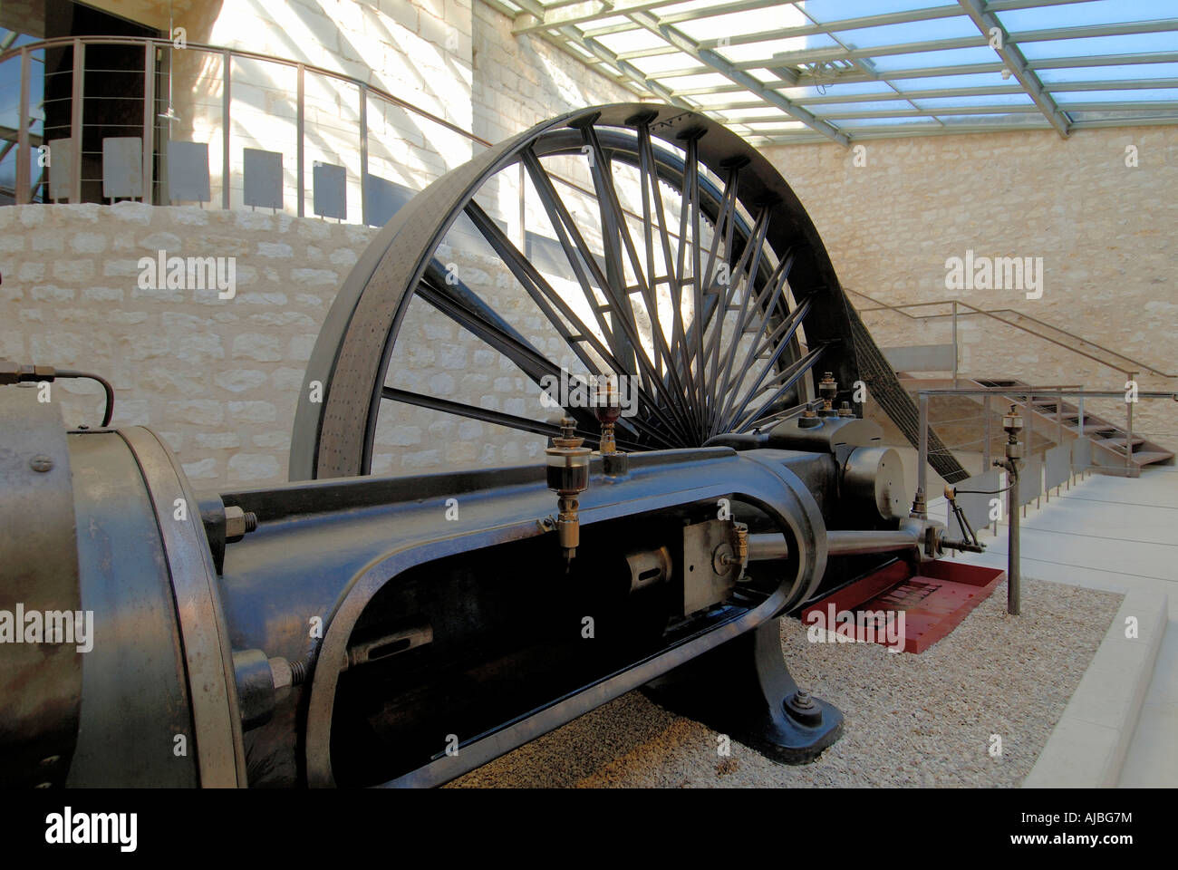 Industrial machinery display inside Donjon de Gouzon, Chauvigny, Vienne, France. Stock Photo