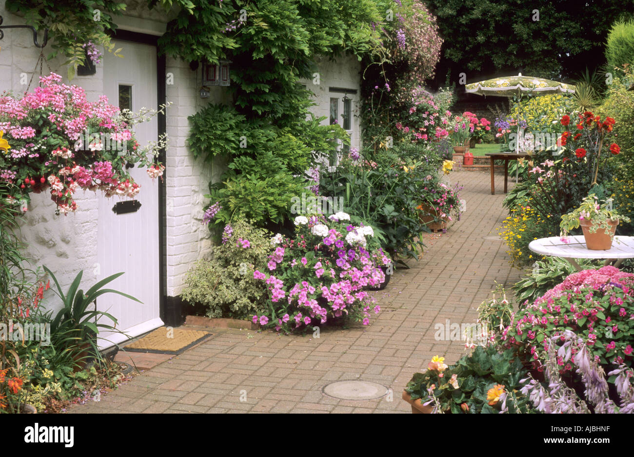 Cottage front garden brick patio hi-res stock photography and images ...