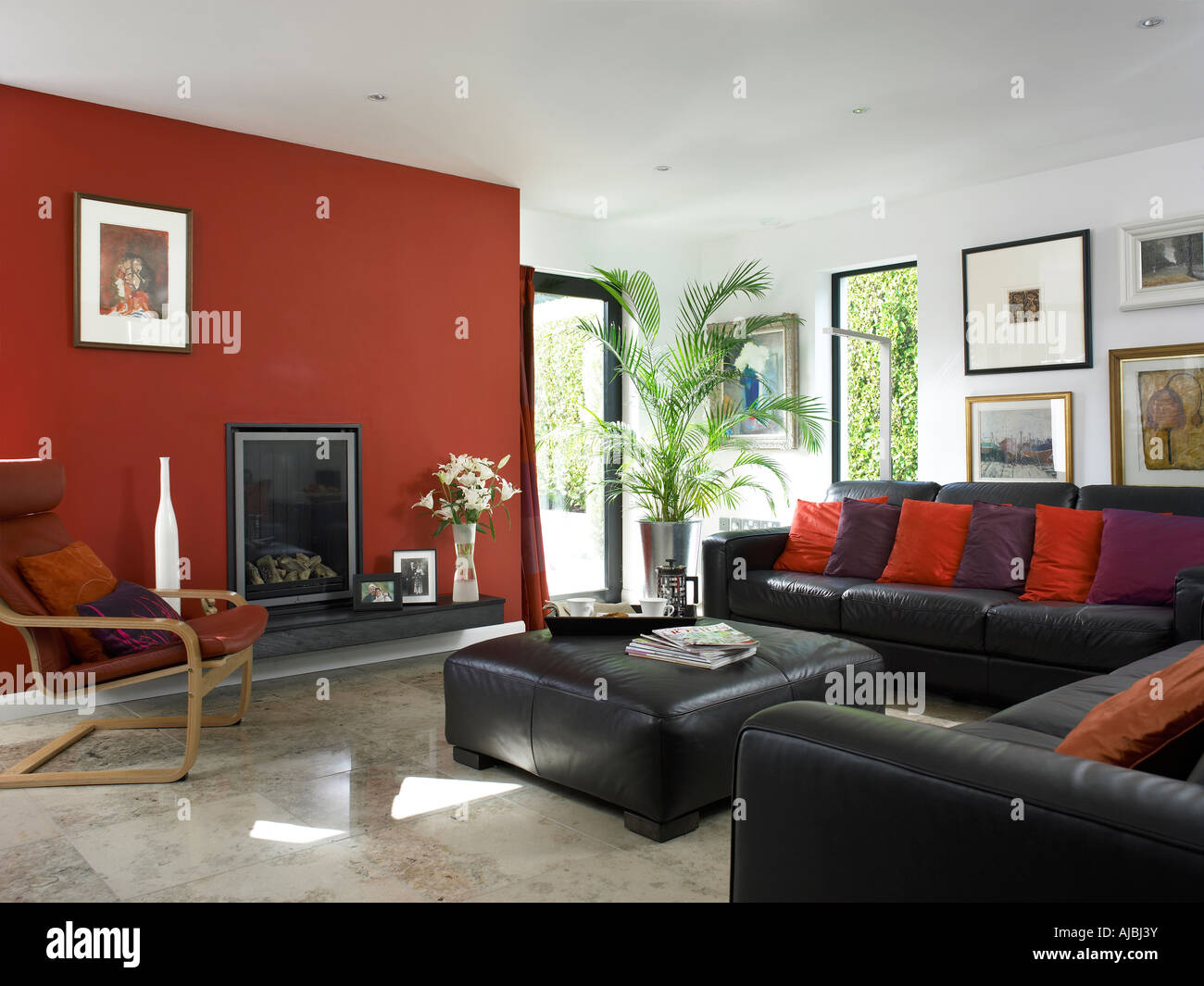 Modern red living room Stock Photo Alamy