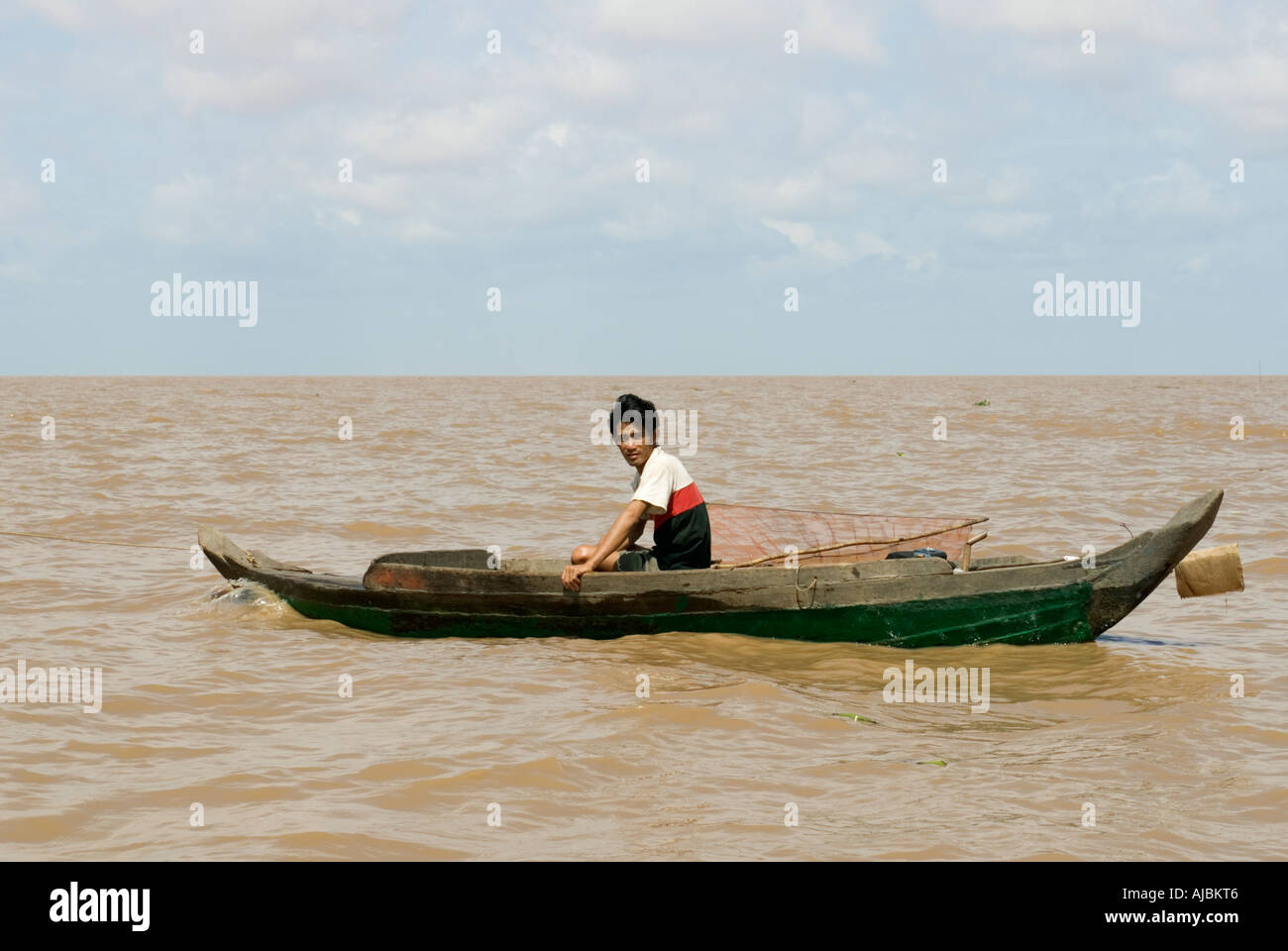 Asian Fisherman Sitting on a Fishing Break on a Boat Stock Photo - Image of  casting, break: 270911622