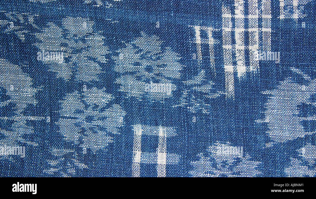 Detail of indigo dyed Japanese tie dyed fabric Kasuri Japan IKAT patterning Stock Photo