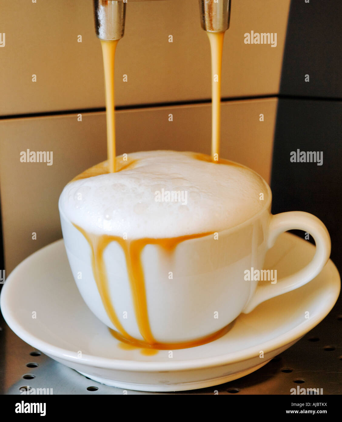 Cup of Cappuccino Overflowing Stock Photo Alamy