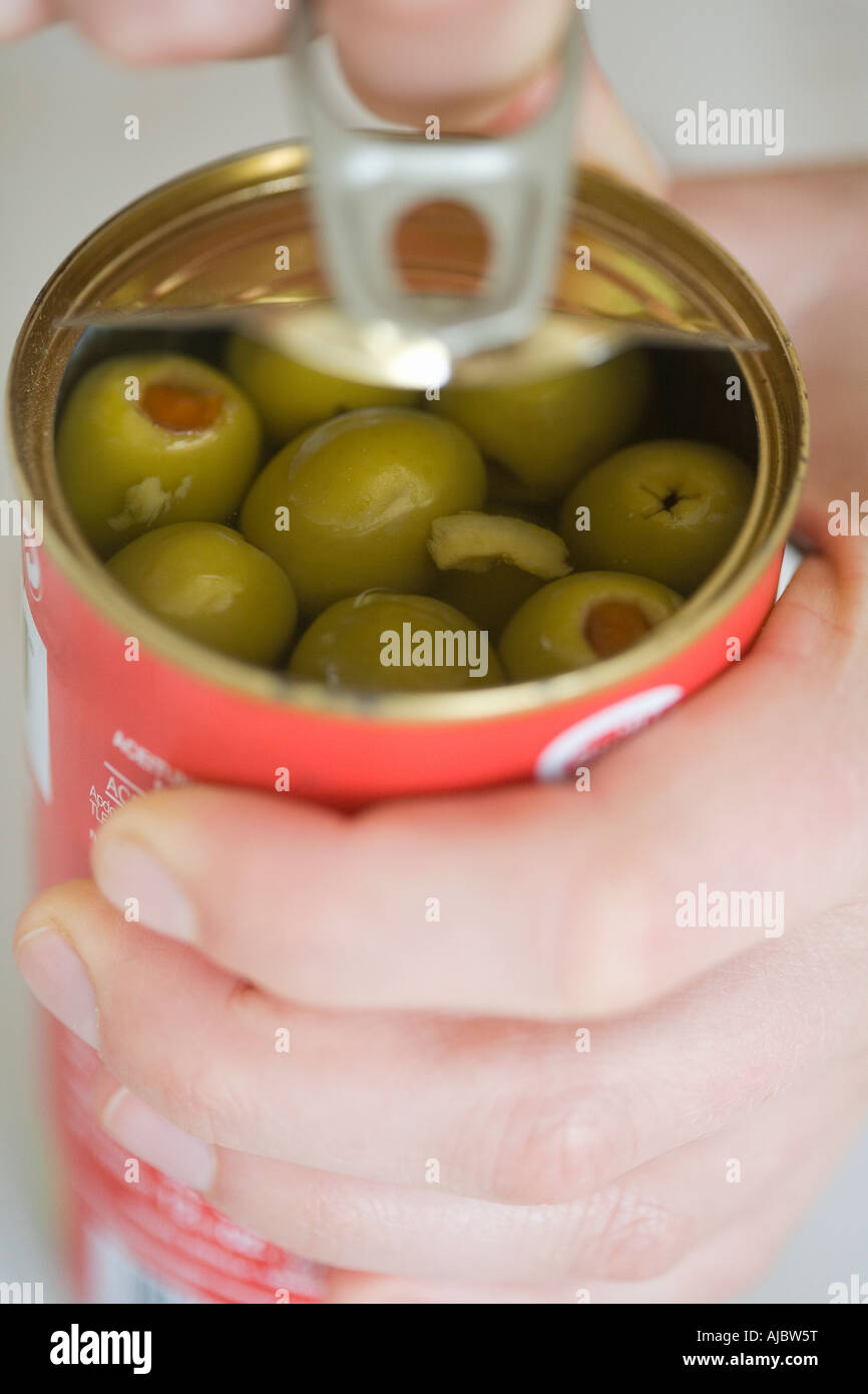 Opening a tin can hires stock photography and images Alamy