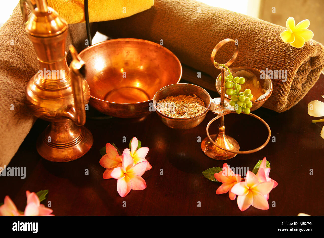 Brass Pot and Bowls with Flowers on a Table Stock Photo Alamy