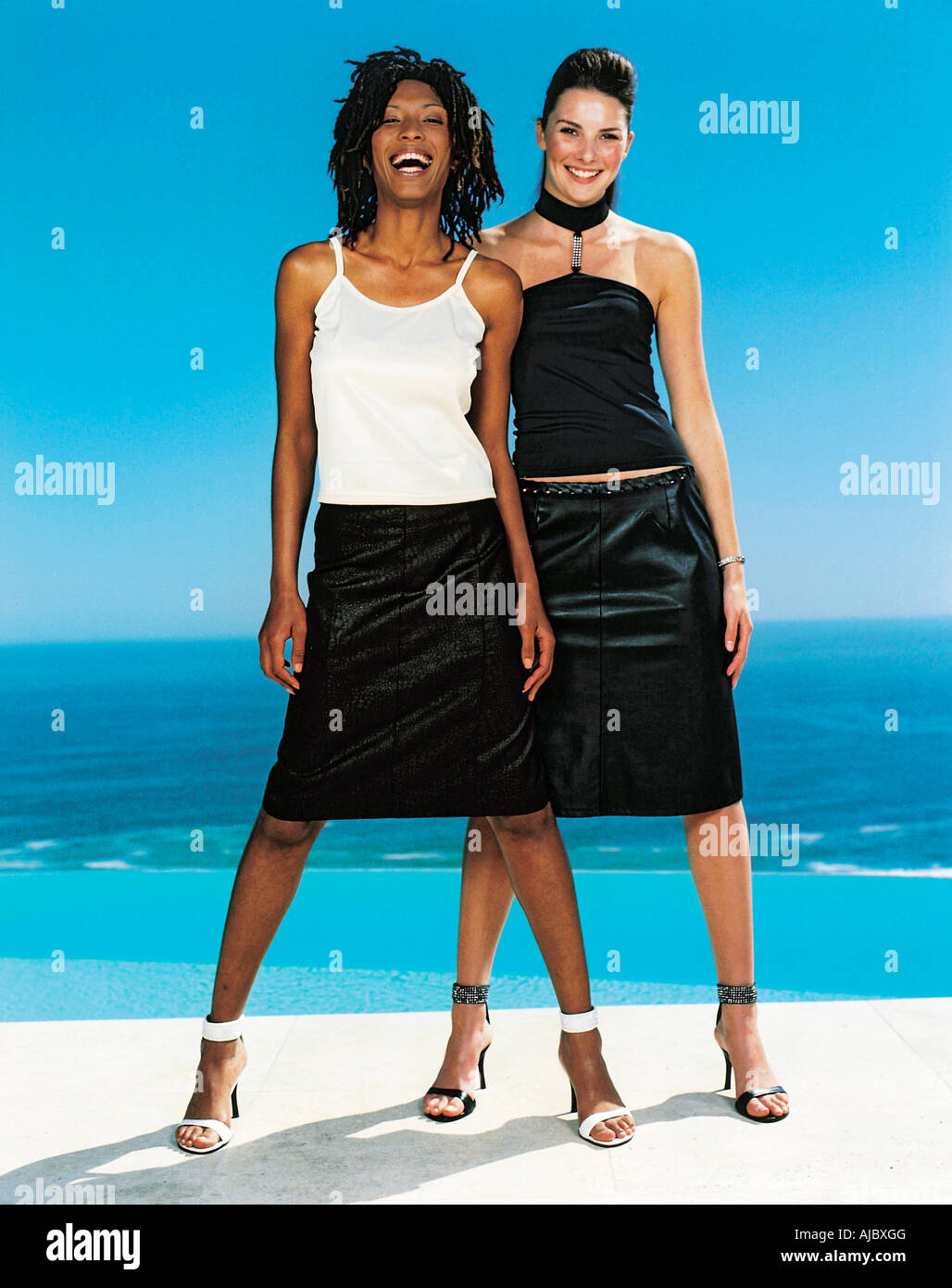Portrait of a Caucasian Woman and an African Woman - Side by Side Stock Photo