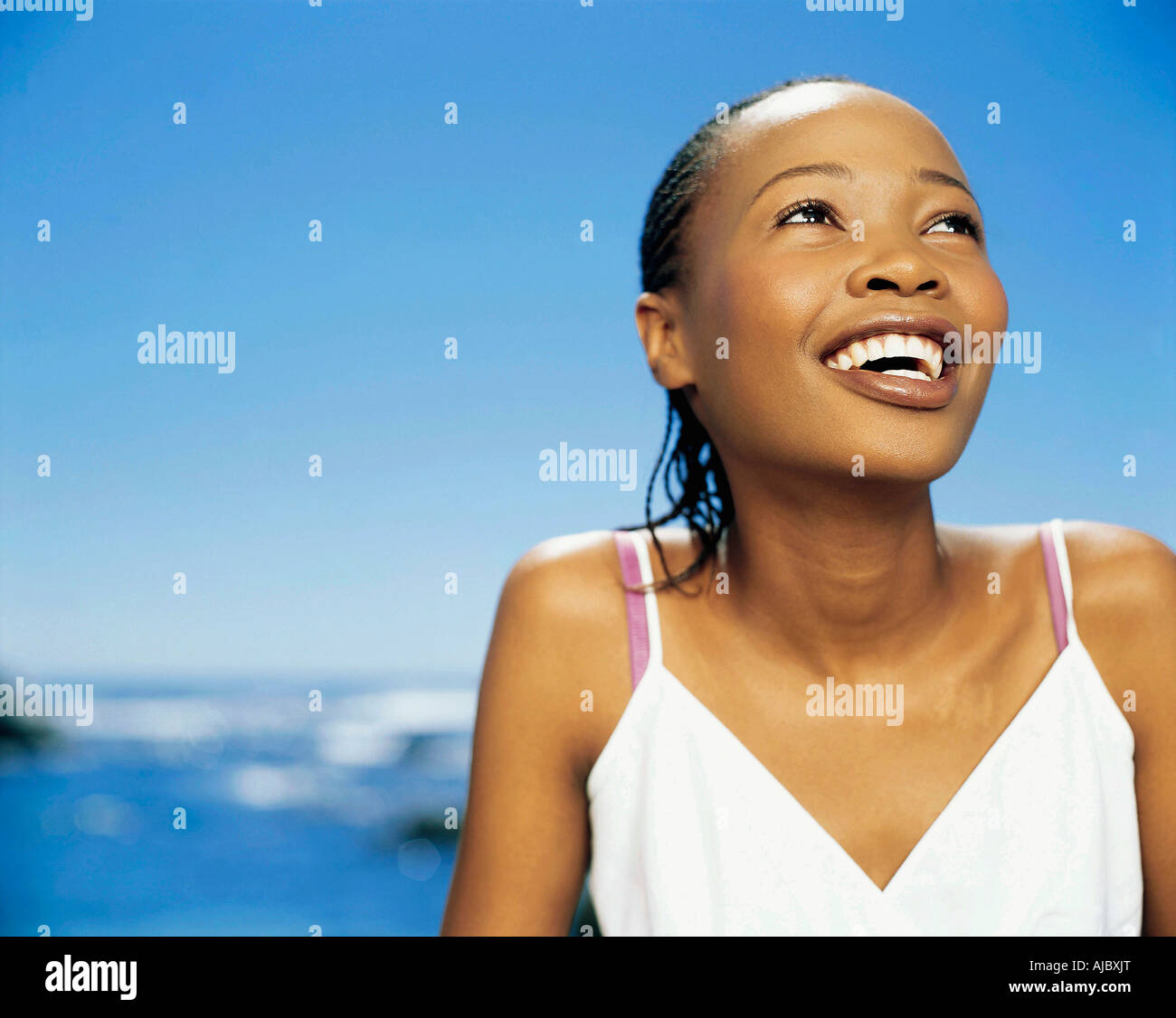 Portrait of an African Woman on the Beach Stock Photo