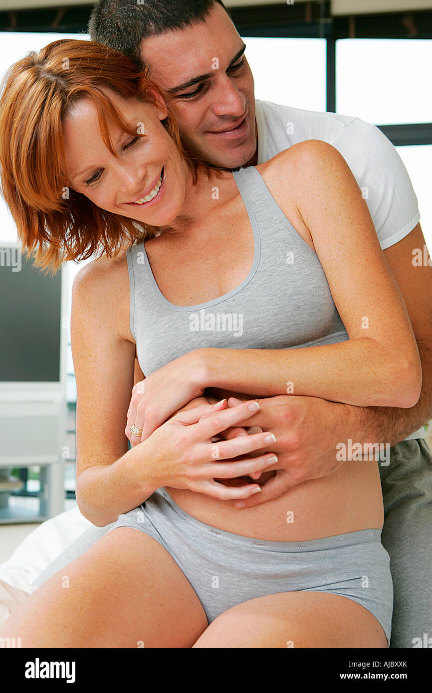 Portrait of a Pregnant Couple Stock Photo