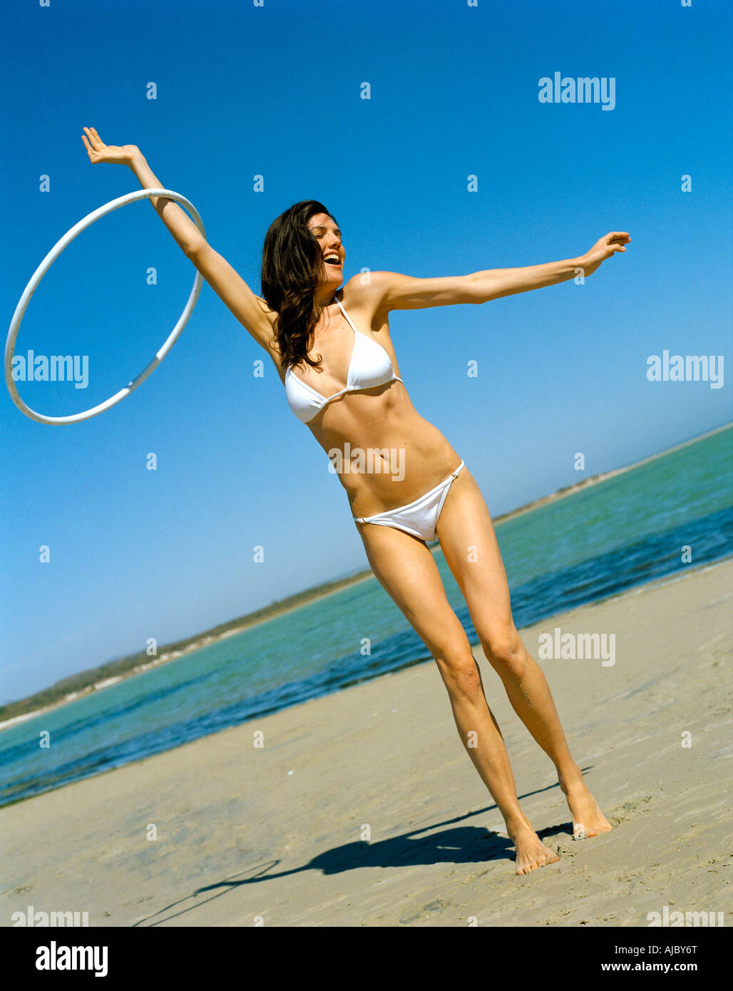 Portrait of a Woman in a Bikini on the Beach Stock Photo