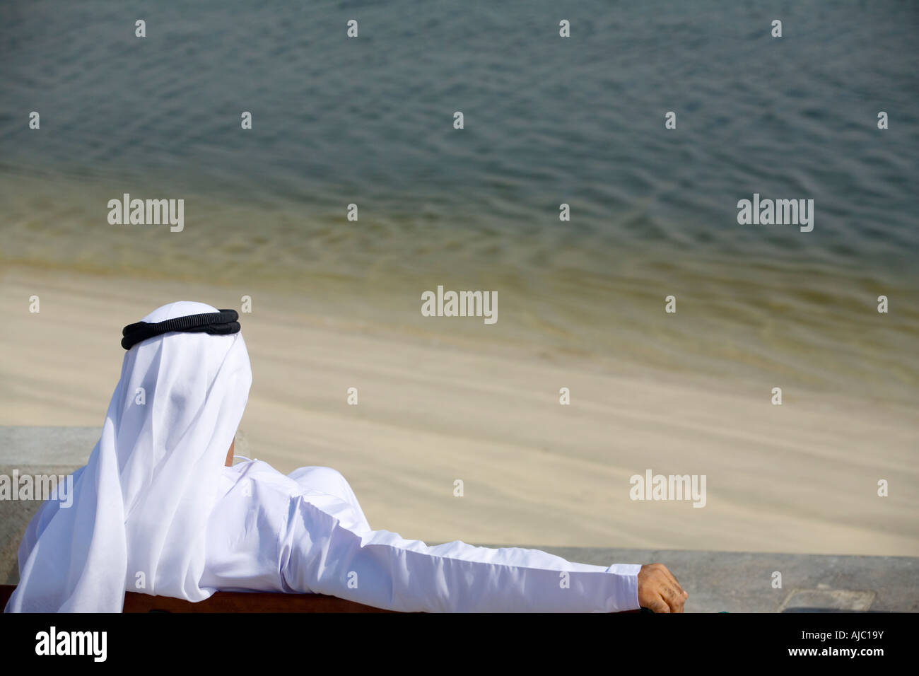 Arab man sitting hi-res stock photography and images - Alamy
