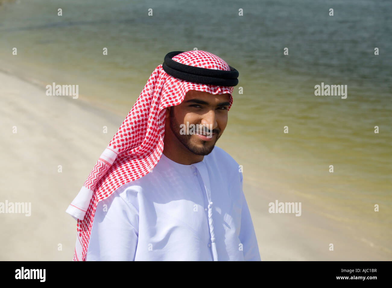 Arab man smiling hi-res stock photography and images - Alamy
