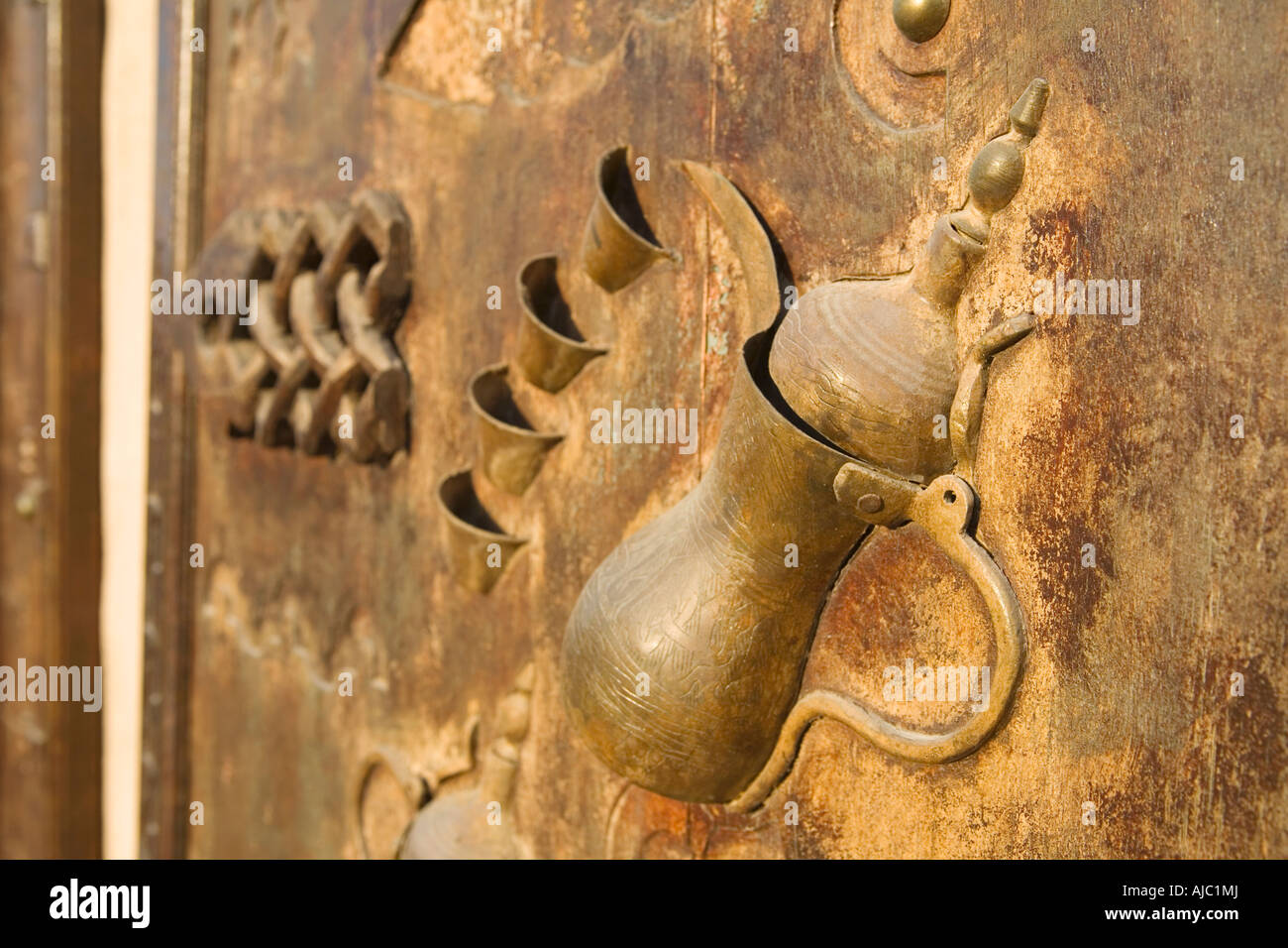 Handcrafted relief of Dallah Stock Photo