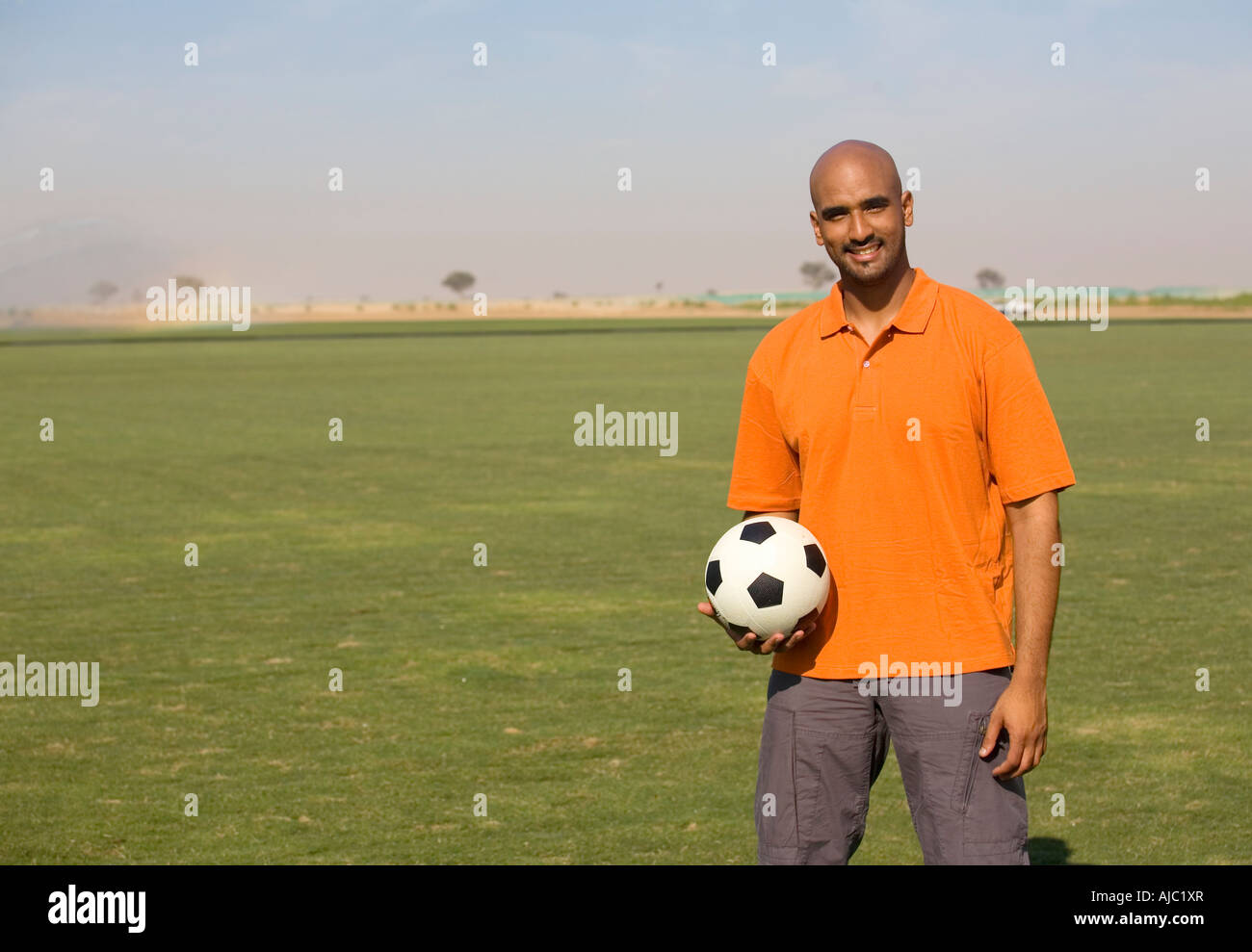 Bald man standing field hi-res stock photography and images - Alamy