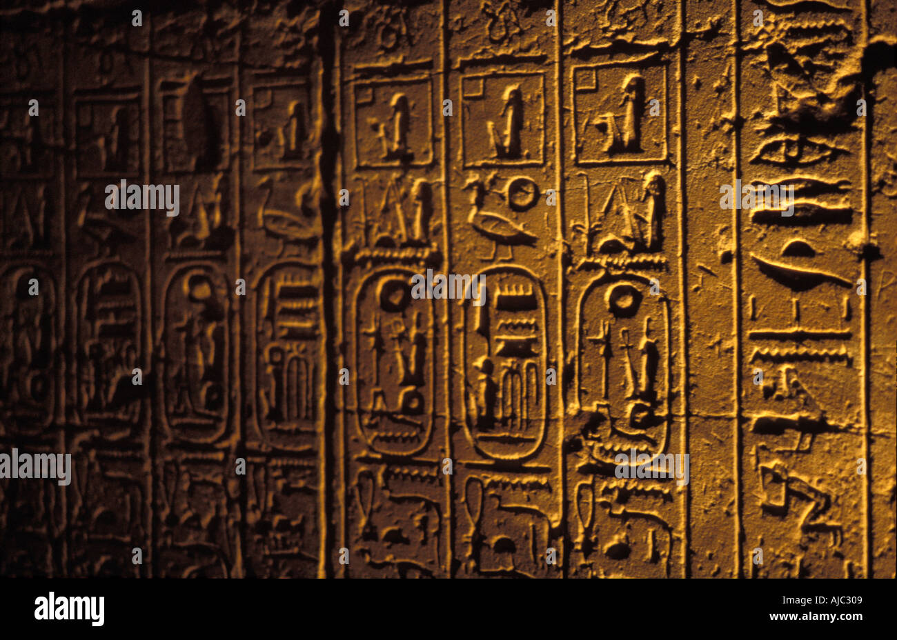 Luxor Temple Egyptial antiquities hieroglyphic carvings on temple wall Luxor Egypt Stock Photo