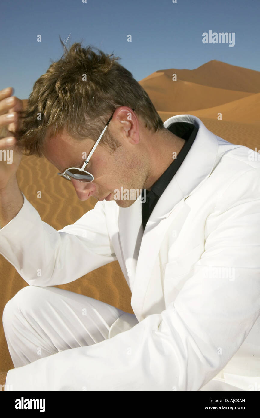 Men in white suit hi-res stock photography and images - Alamy