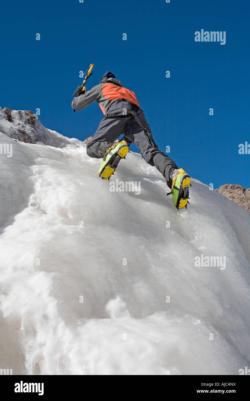 Man at ice climbing low angle view hi-res stock photography and images ...