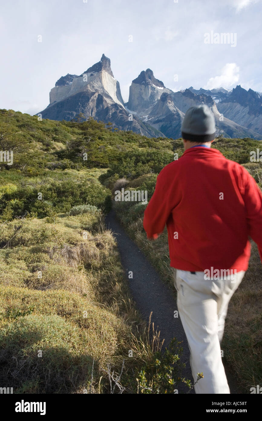 Tourist Hiking on a Remote Mountain Path Stock Photo