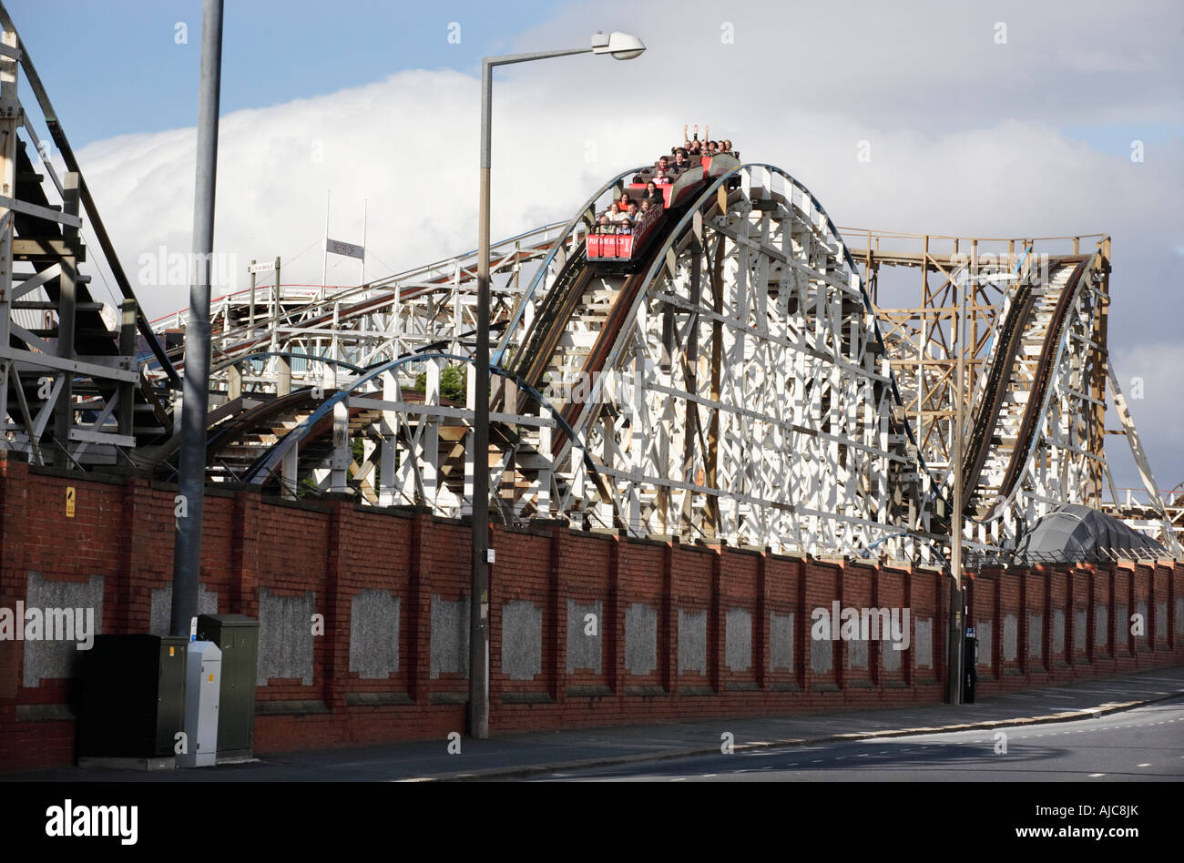 A roller coaster at Blackpool Pleasure Beach, UK, seen from a back street Stock Photo