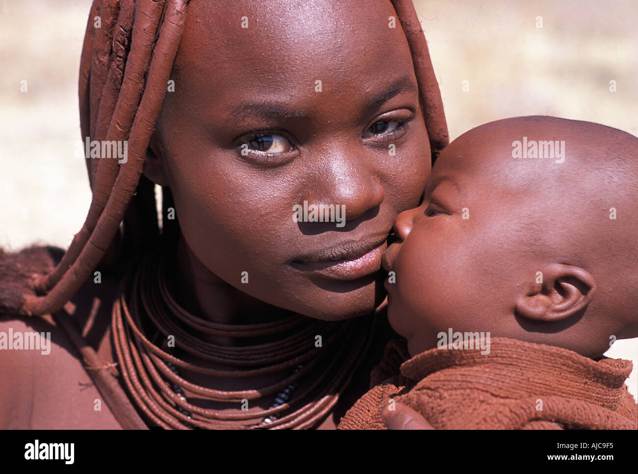 NAMIBIA Himba mother and baby Kaokoveld south of Opuwo Namibia Photo by Jamie Marshall Stock Photo