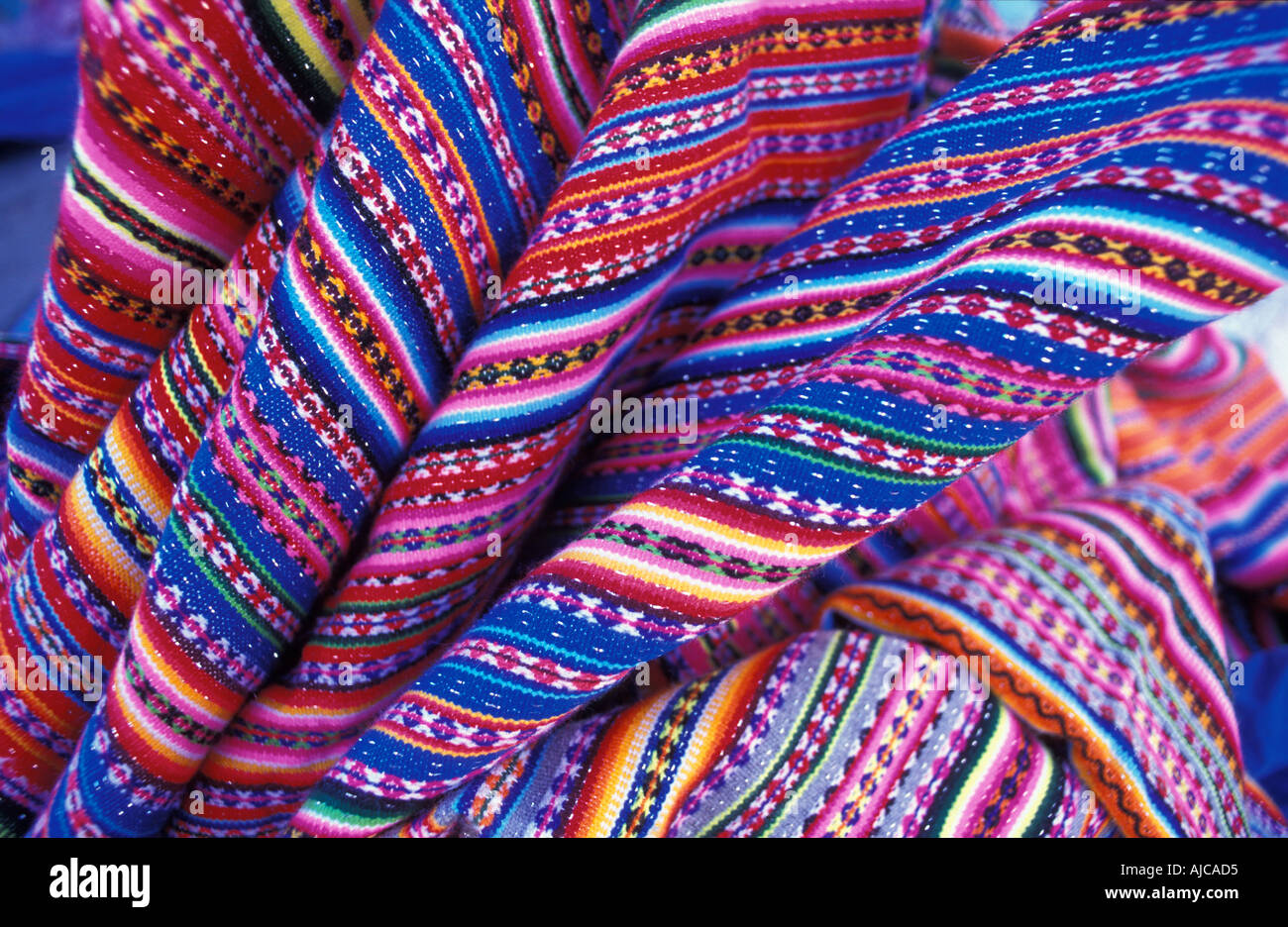 Colourful woven fabric for sale at market Huaraz Northern Peru Stock Photo