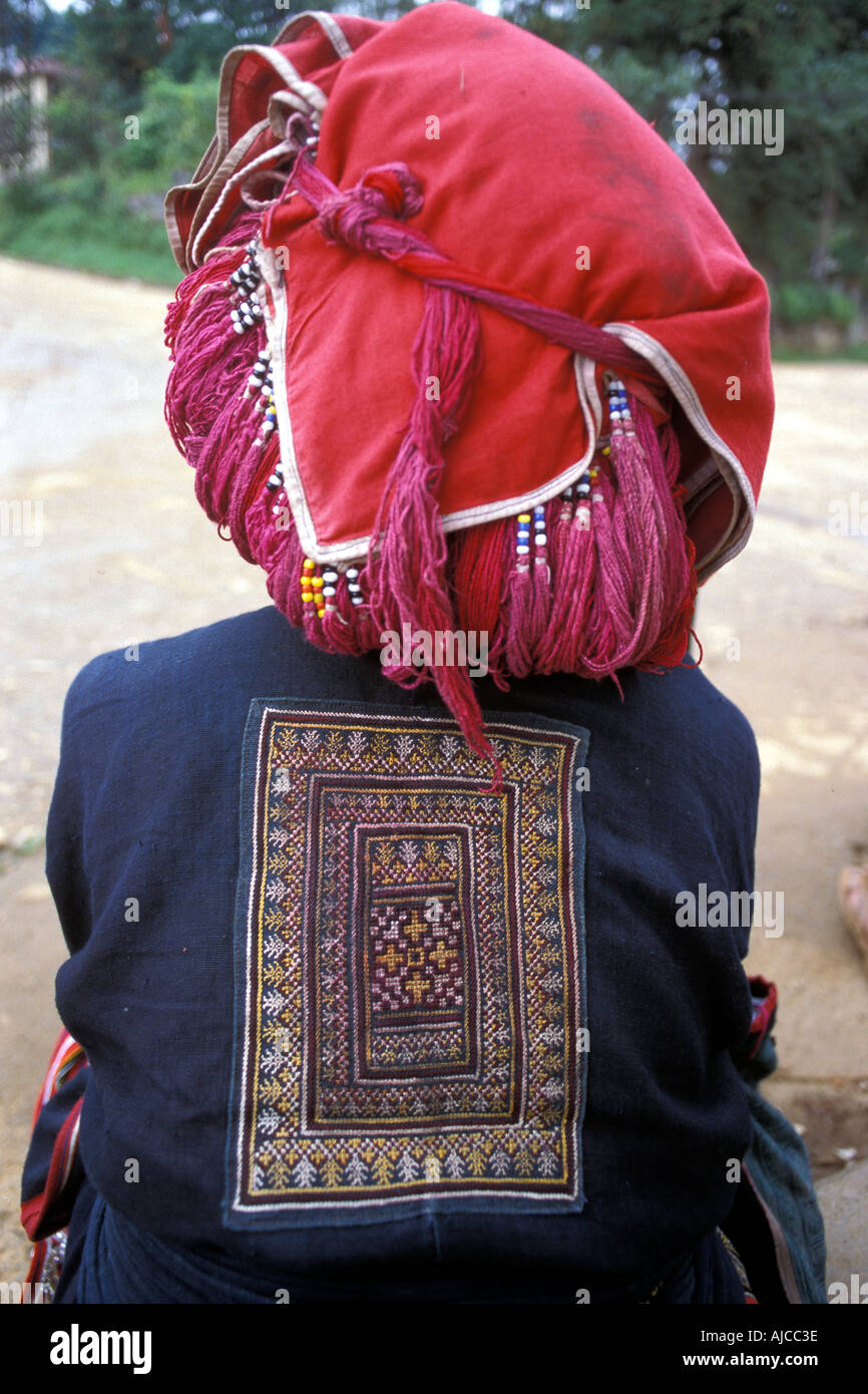 Woman from the Red Dao Dzao hilltribe in distinctive tribal costume Sapa Vietnam Stock Photo
