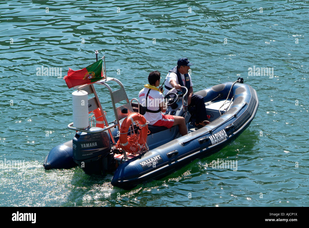 two man in a rubber boat Stock Photo - Alamy