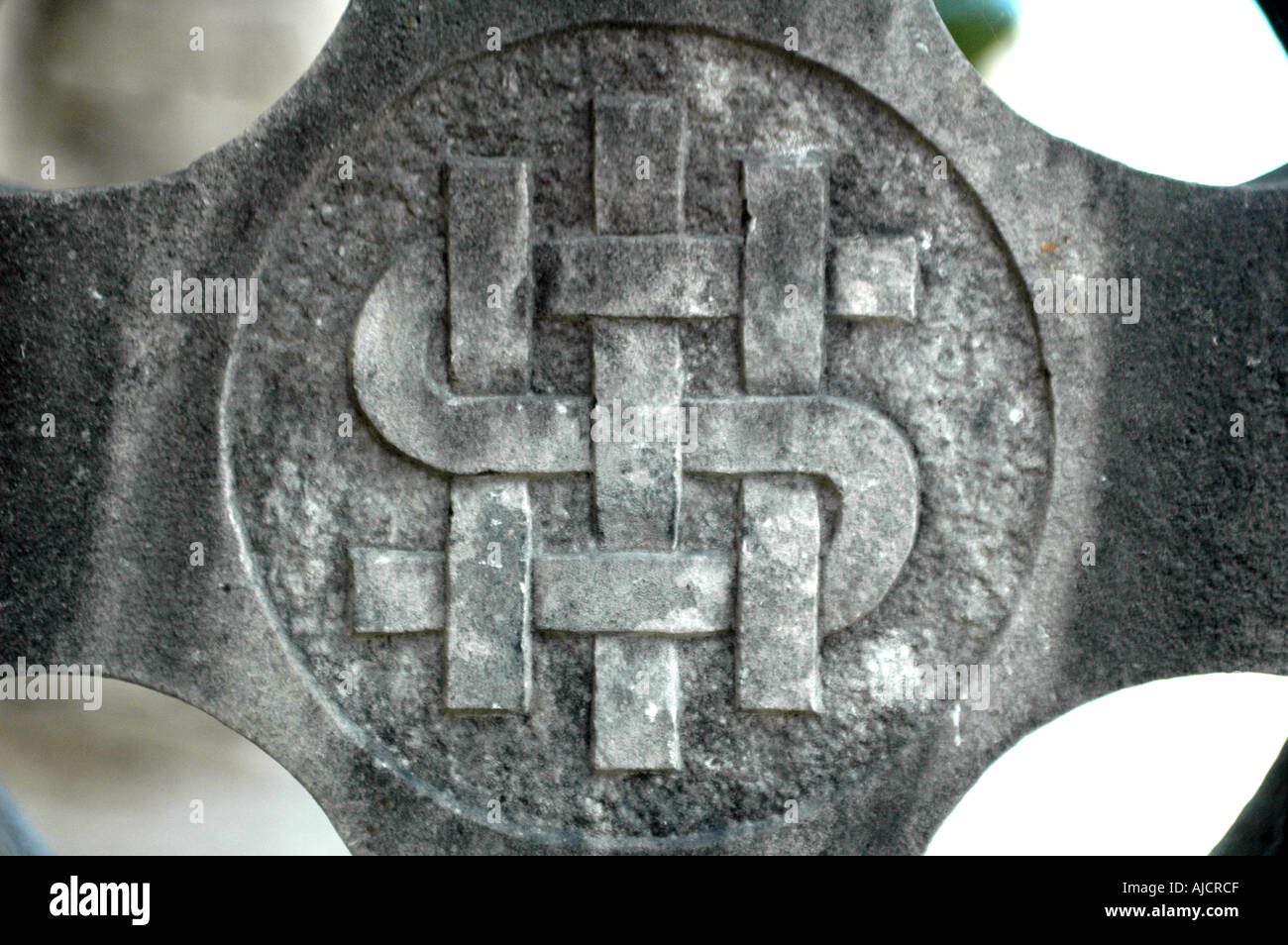 Celtic weave design on a grave stone cross in the Abbey graveyard at