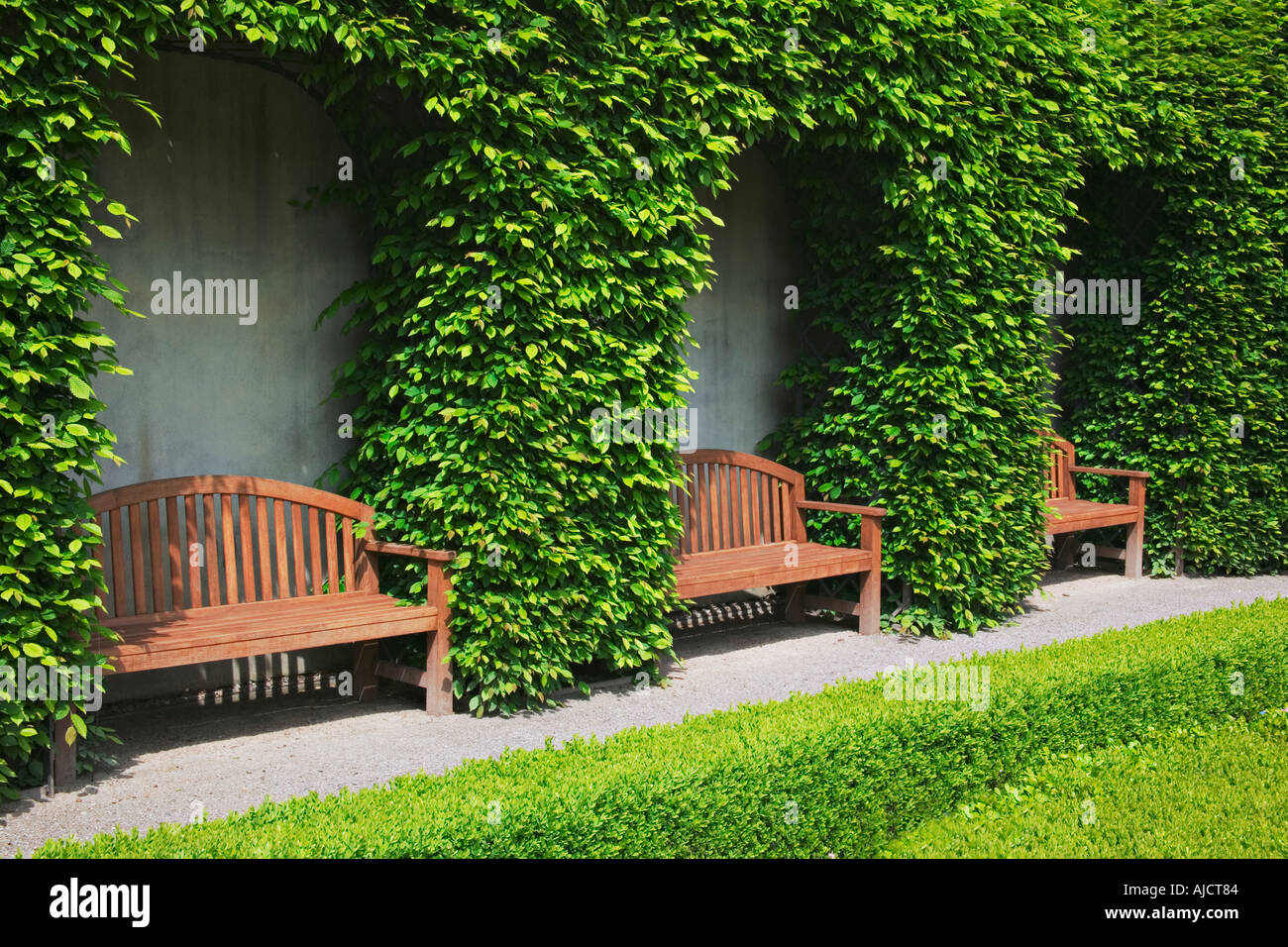 Wooden Benches in the beautiful Baroque garden at Vrtba Garden Old ...