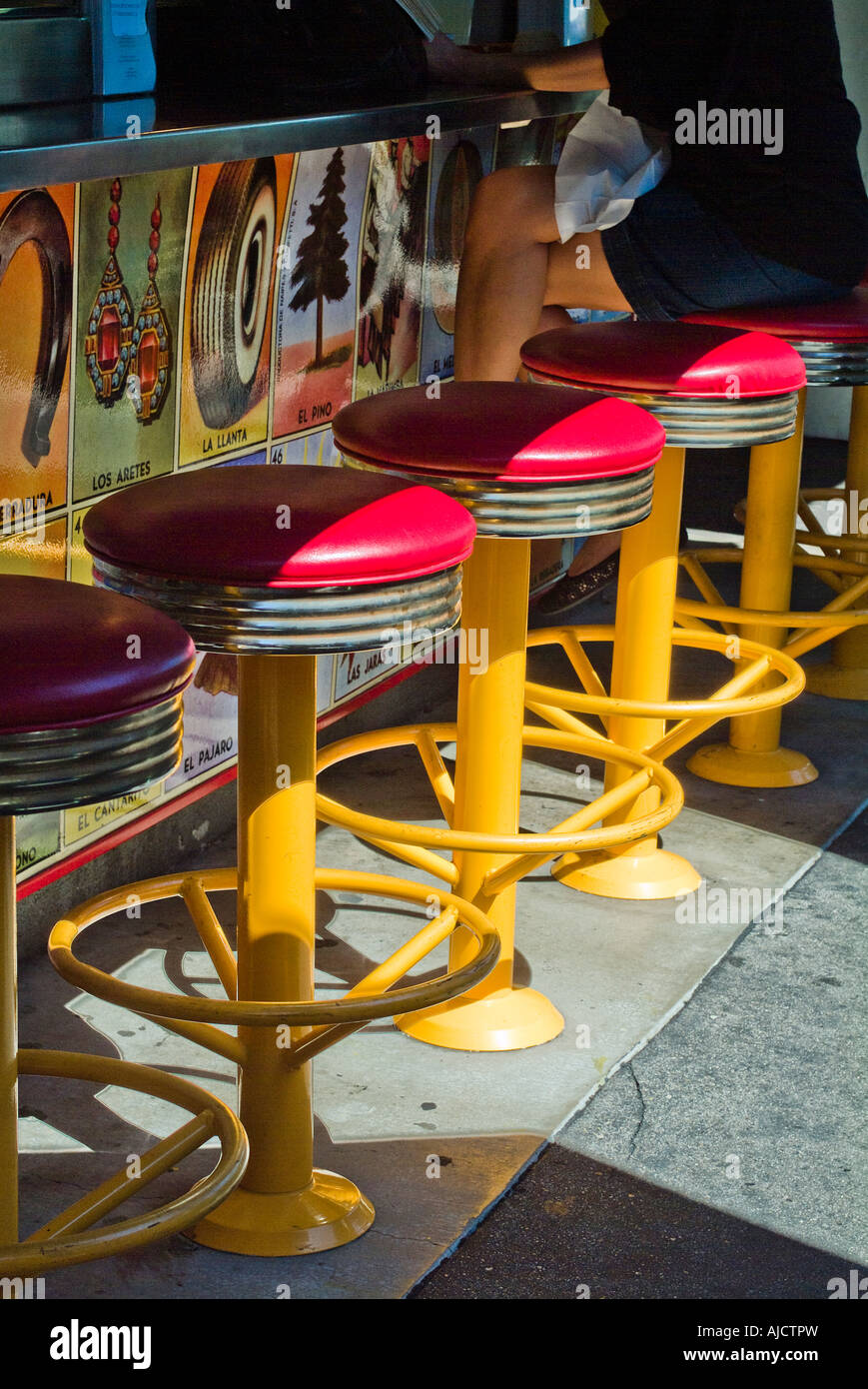 Colorful bright bar stools at diner Stock Photo