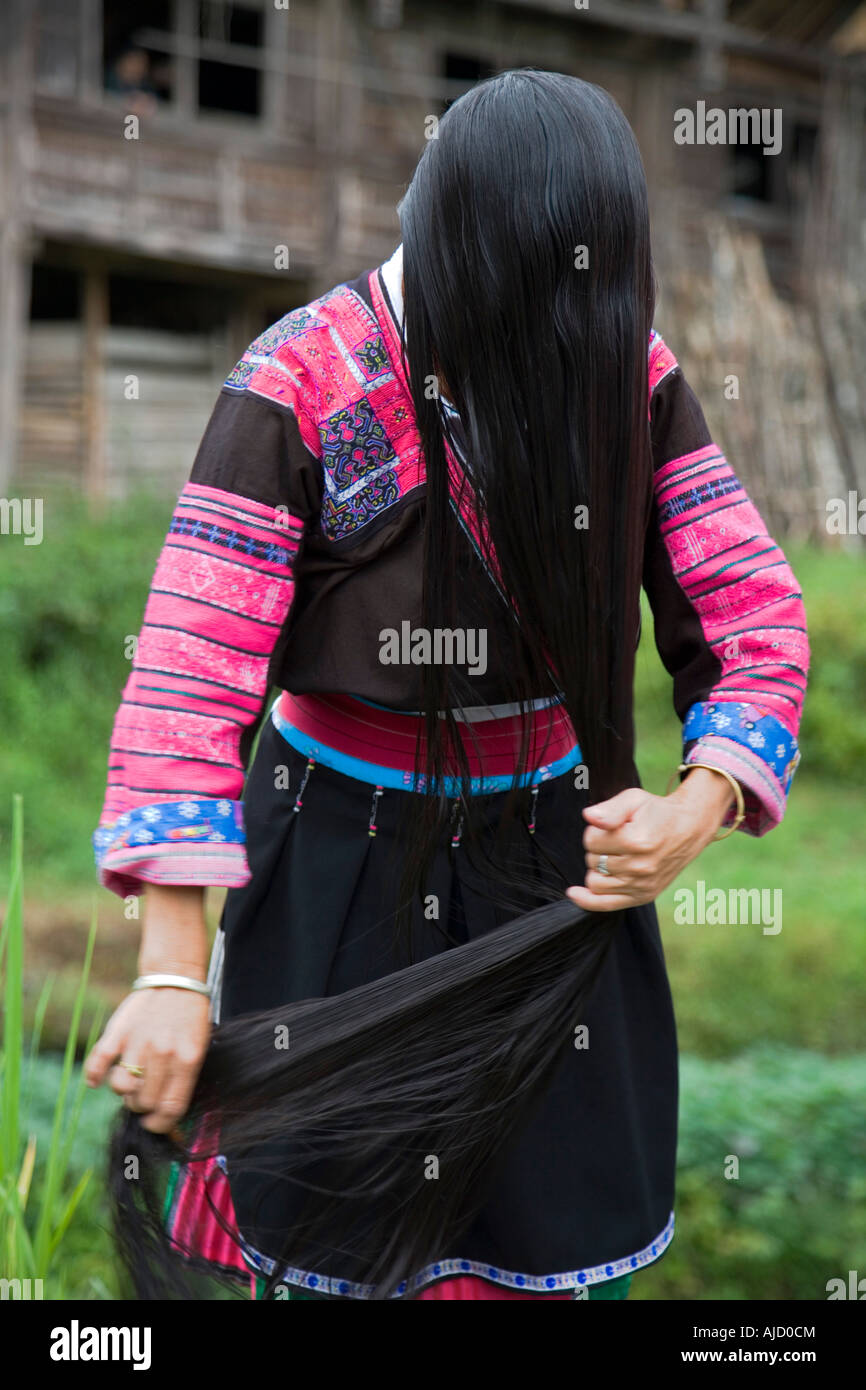 A Red Yao Woman Combing Out Her Amazing Long Hair Her Village Is