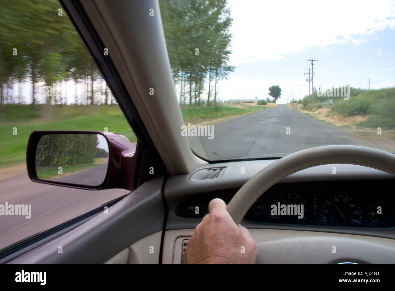 Driving on a rural road in Idaho Stock Photo
