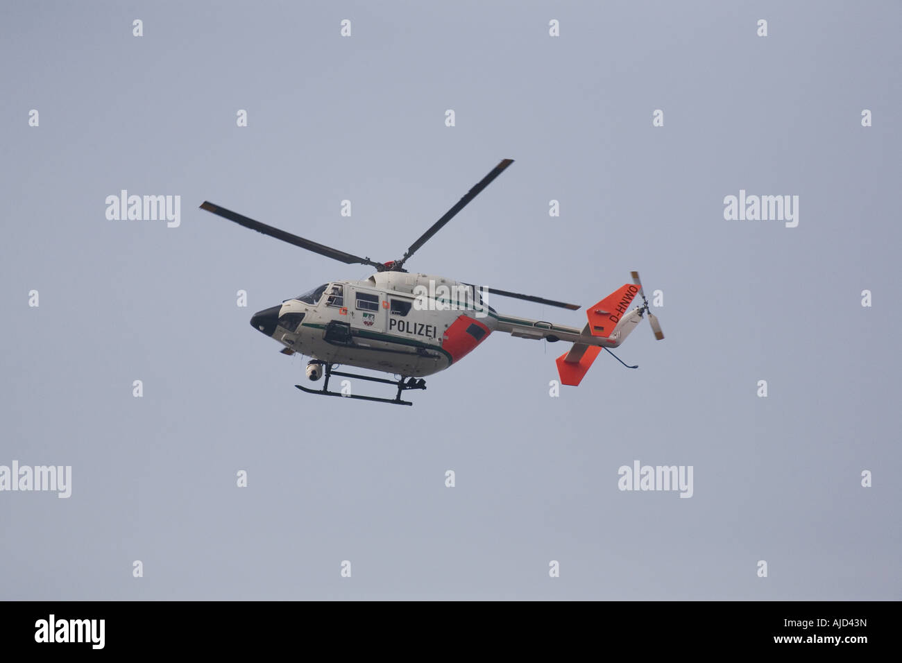 police-helicopter flying over the Love Parade, Germany, North Rhine-Westphalia, Ruhr Area, Essen  Stock Photo