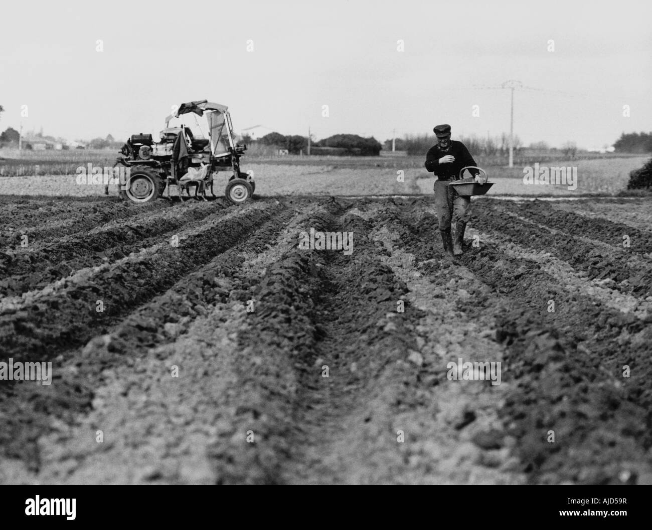 Tractor sowing seed Black and White Stock Photos & Images - Alamy