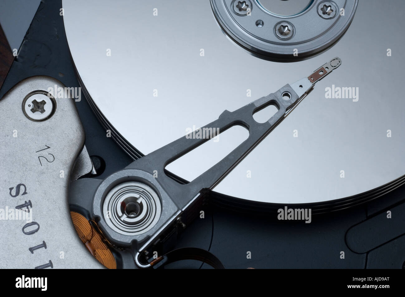 Computer hard disk drive mechanism show the read write head Stock Photo