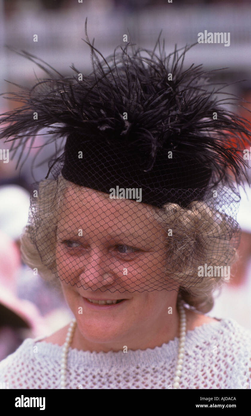 Woman 1980s UK fashionable hat and veil Ladies Day Royal Ascot fashion. Berkshire England. 1985 HOMER SYKES Stock Photo