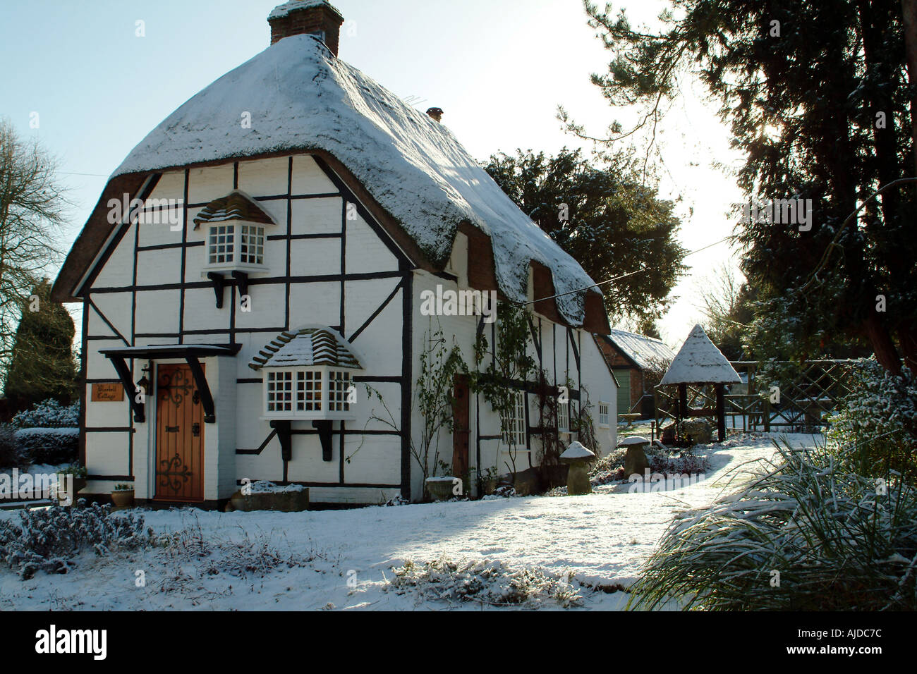 Snow Covered English Country Thatched Cottage Hampshire England UK