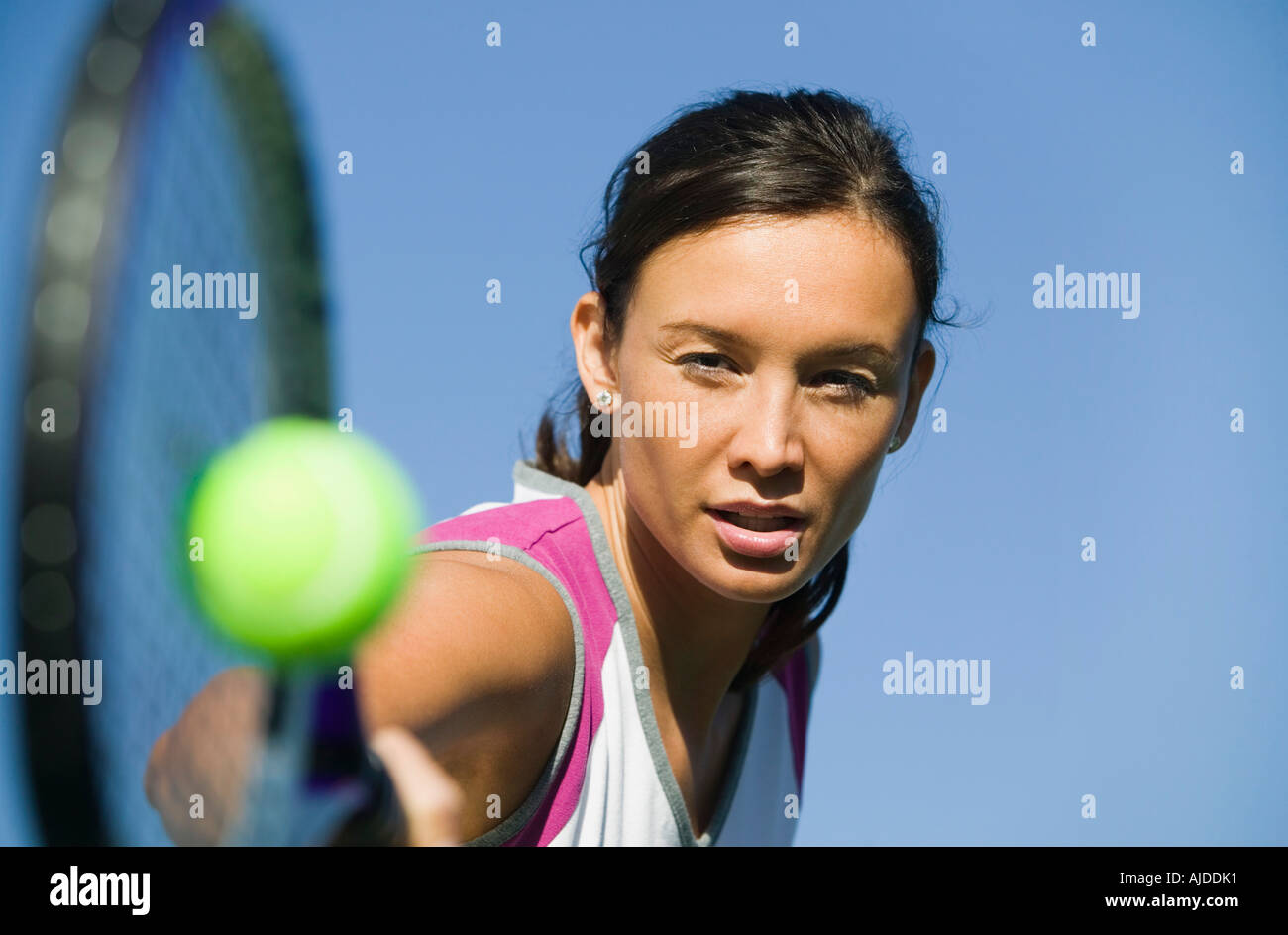 Female Tennis Player Hitting Ball Close Up Of Racket Focus On Player Stock Photo Alamy