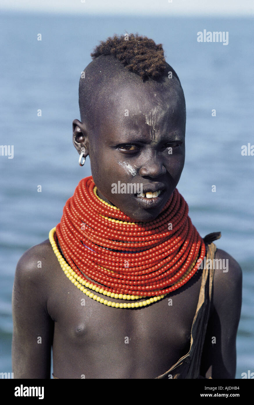 El Molo teenage girl with bead necklaces El Molo Bay Lake Turkana northern Kenya East Africa Stock Photo