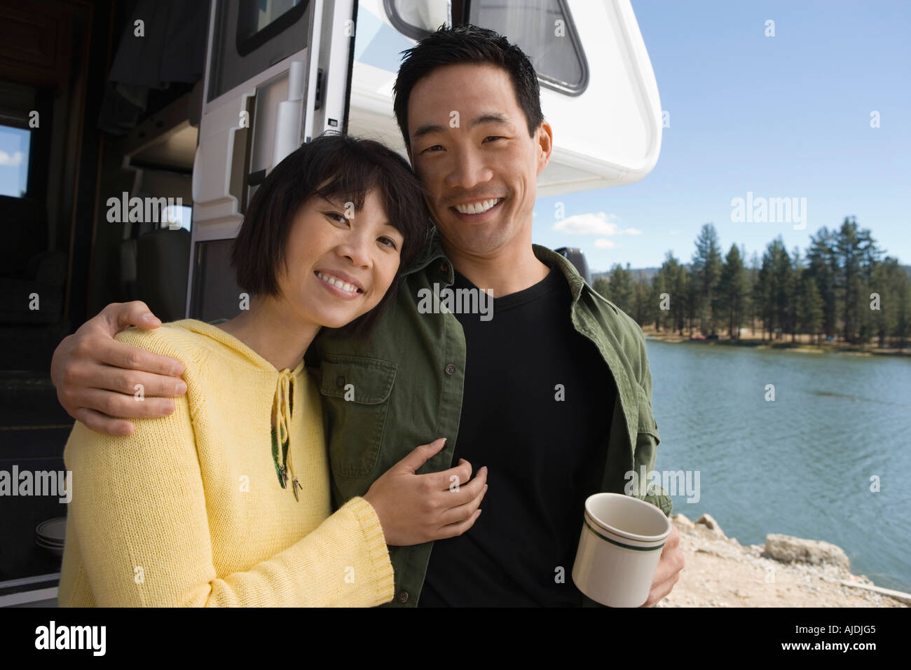 Couple with arm around each other hi-res stock photography and images ...